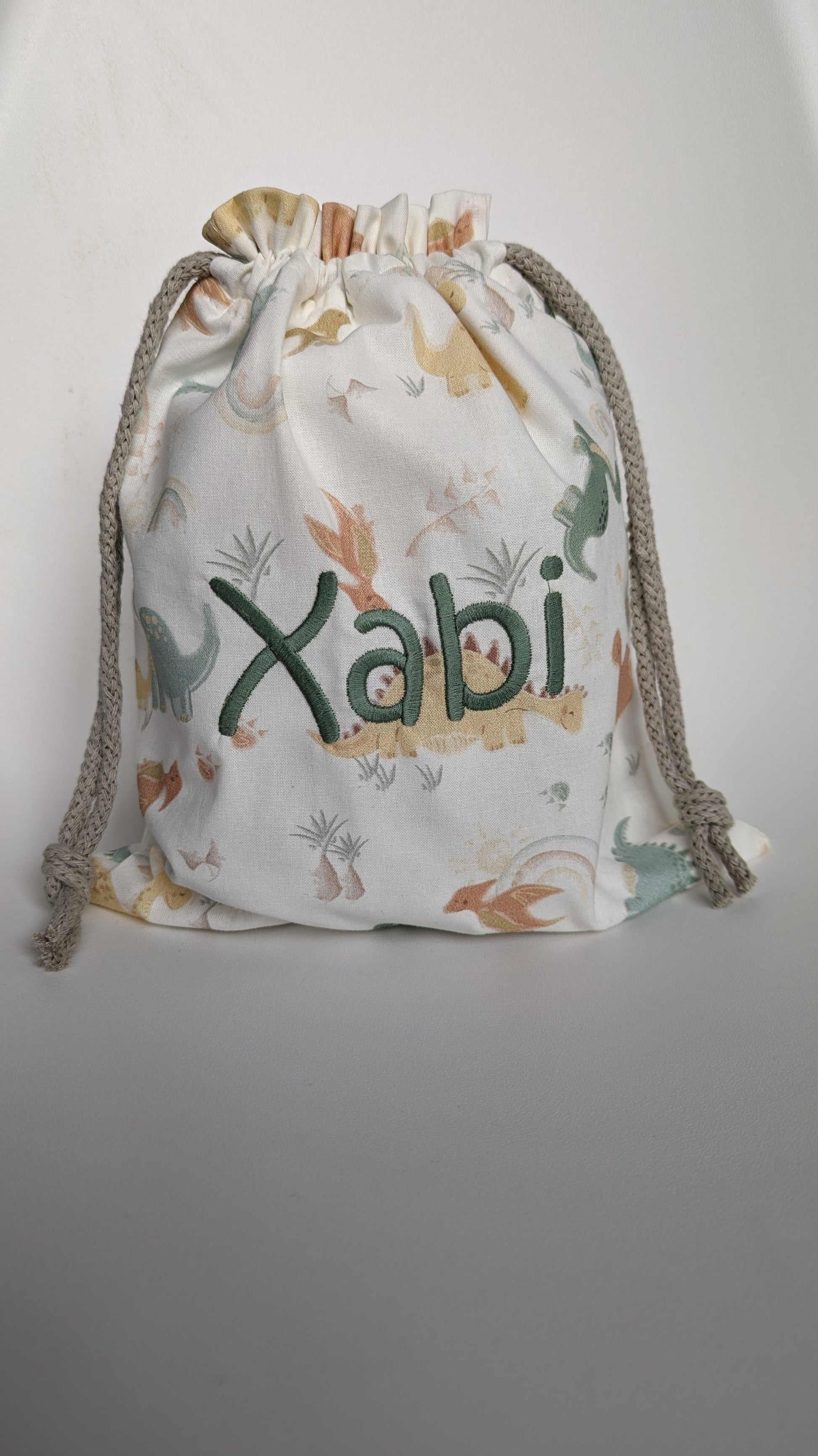 Bolsa Dinos pastel